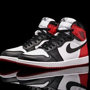 Air Jordan retro 1s (black toe)